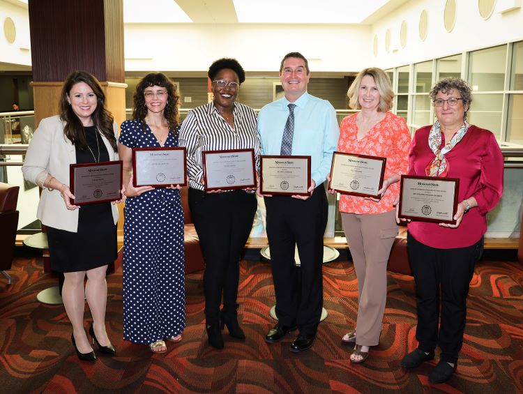 six faculty and staff recipients